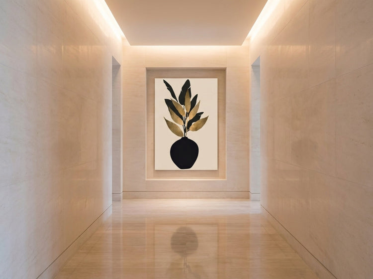 Vyloire statement pieces — black and gold botanical print in a marble corridor niche