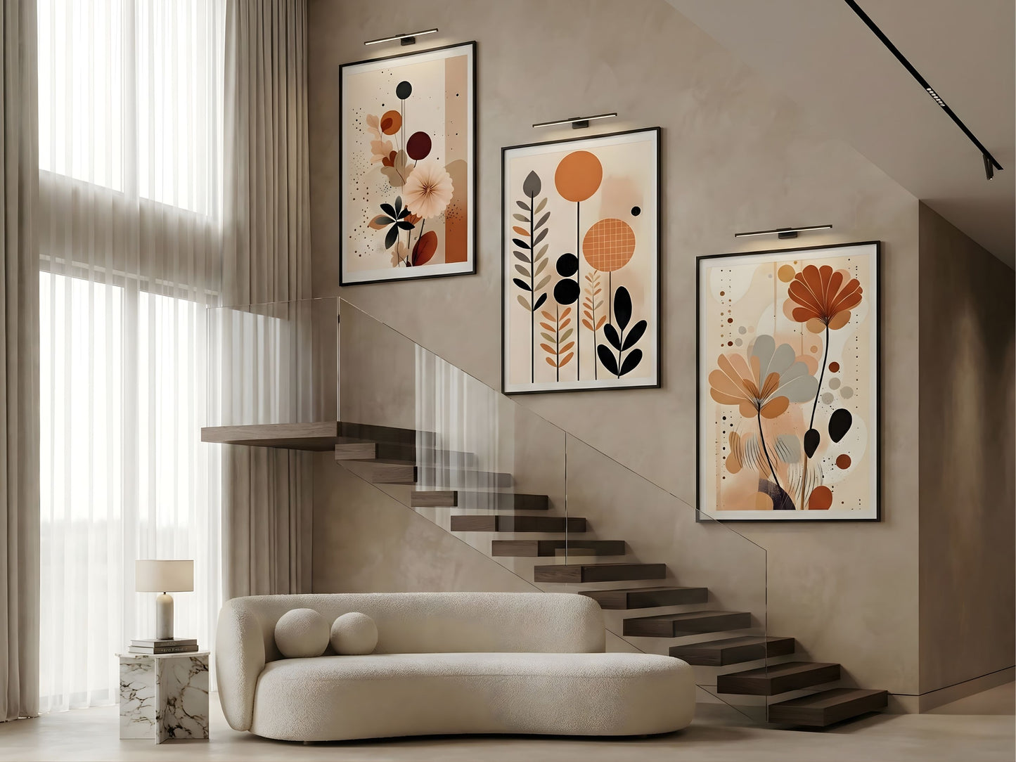 Earth-tone abstract botanical wall art set of 3 in black frames climbing a staircase gallery wall by VYLOIRE