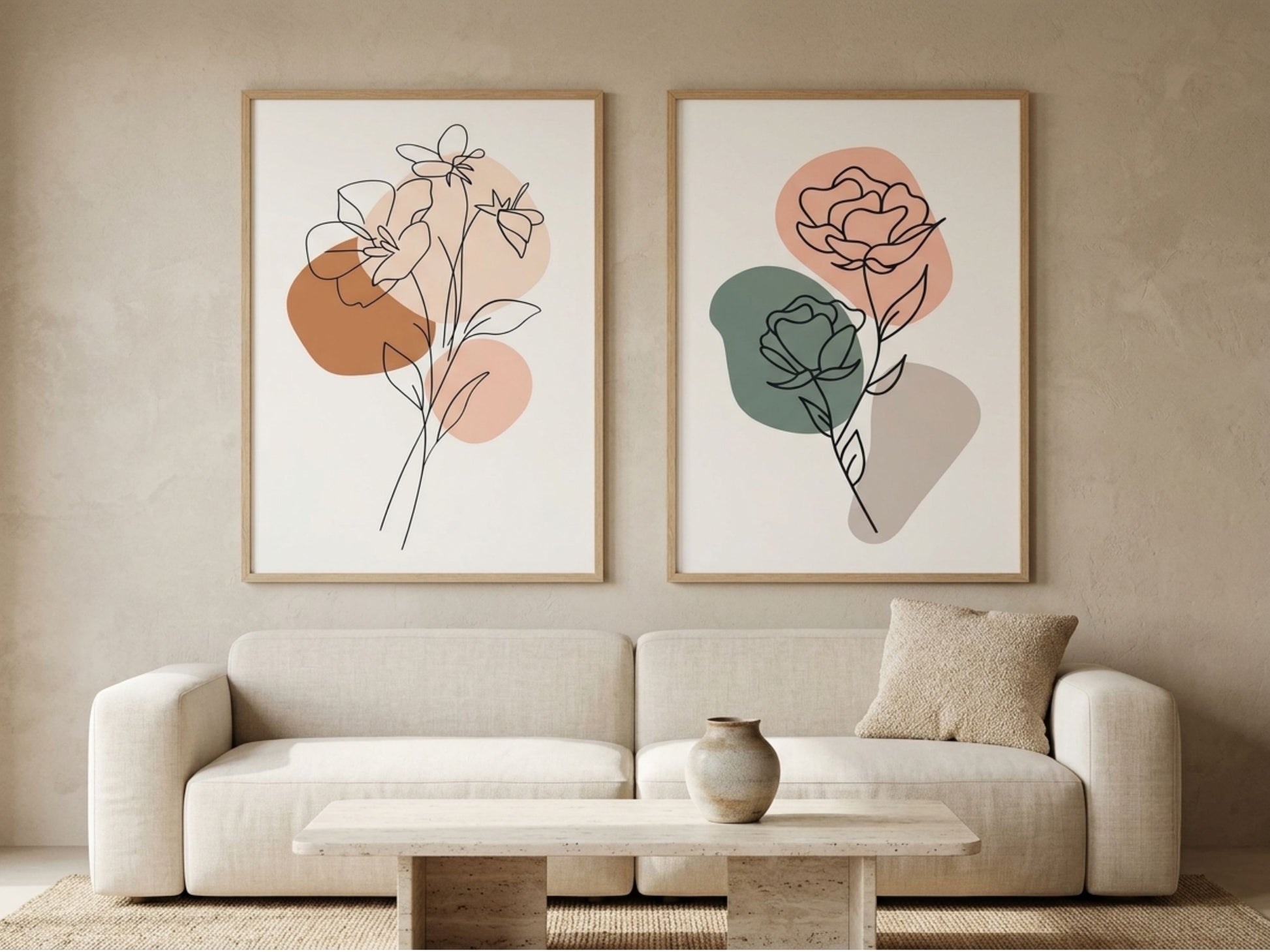 Botanical line-art wall art set of 2 with charcoal florals in terracotta and sage, oak frames, in a modern neutral living room by VYLOIRE
