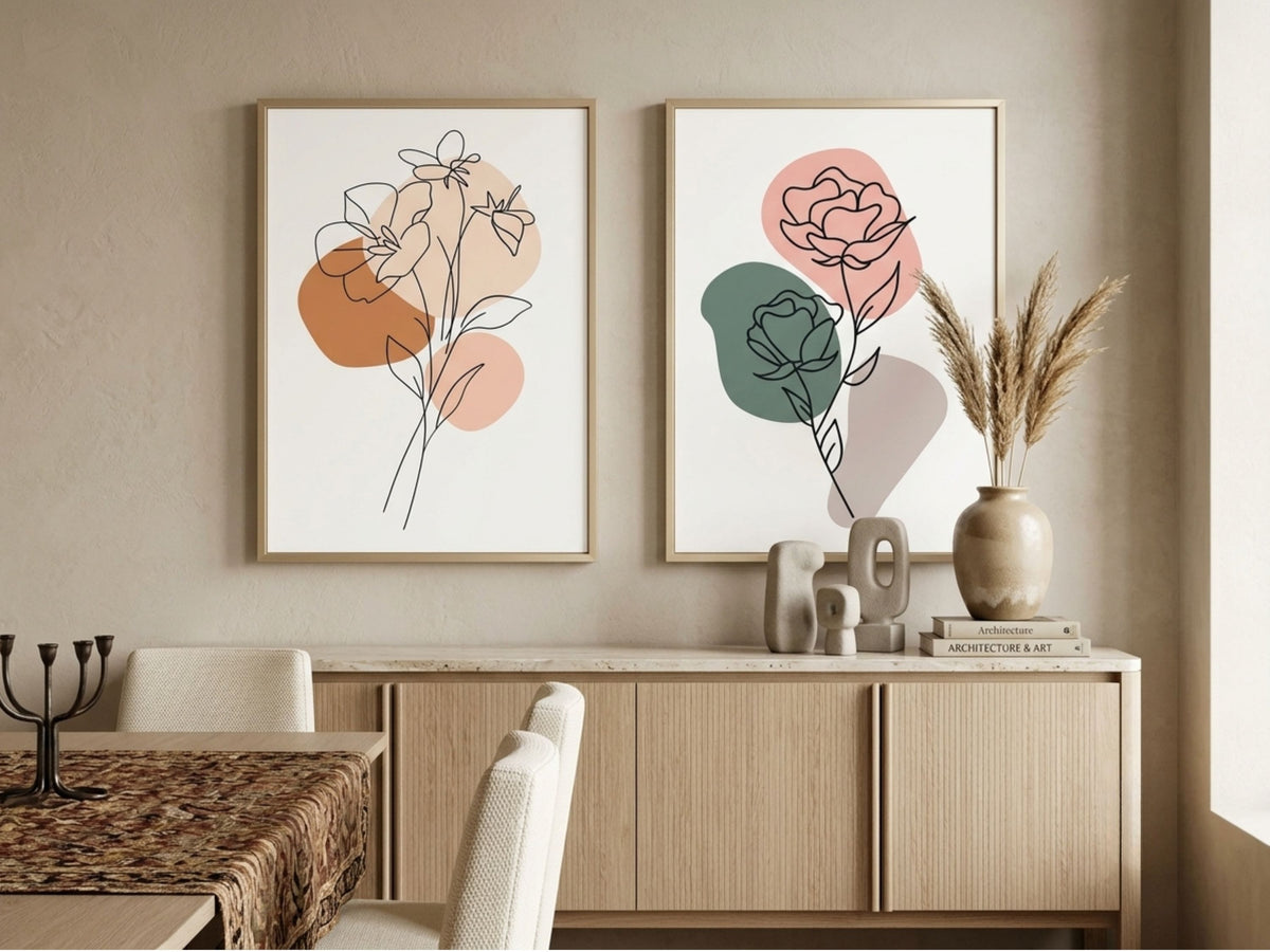 Luxury botanical line-art wall art set of 2 in terracotta, sage and blush, oak frames, above a wood dining sideboard by VYLOIRE
