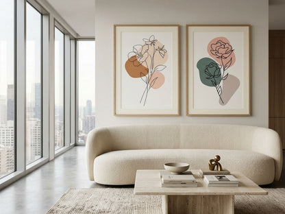 Luxury botanical line-art wall art set of 2 in terracotta and sage, oak frames, in a modern penthouse living room with city views by VYLOIRE