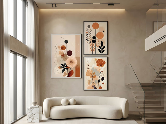 Modern abstract botanical triptych set of 3 in terracotta, rust and charcoal, black frames, in a luxury living room by VYLOIRE